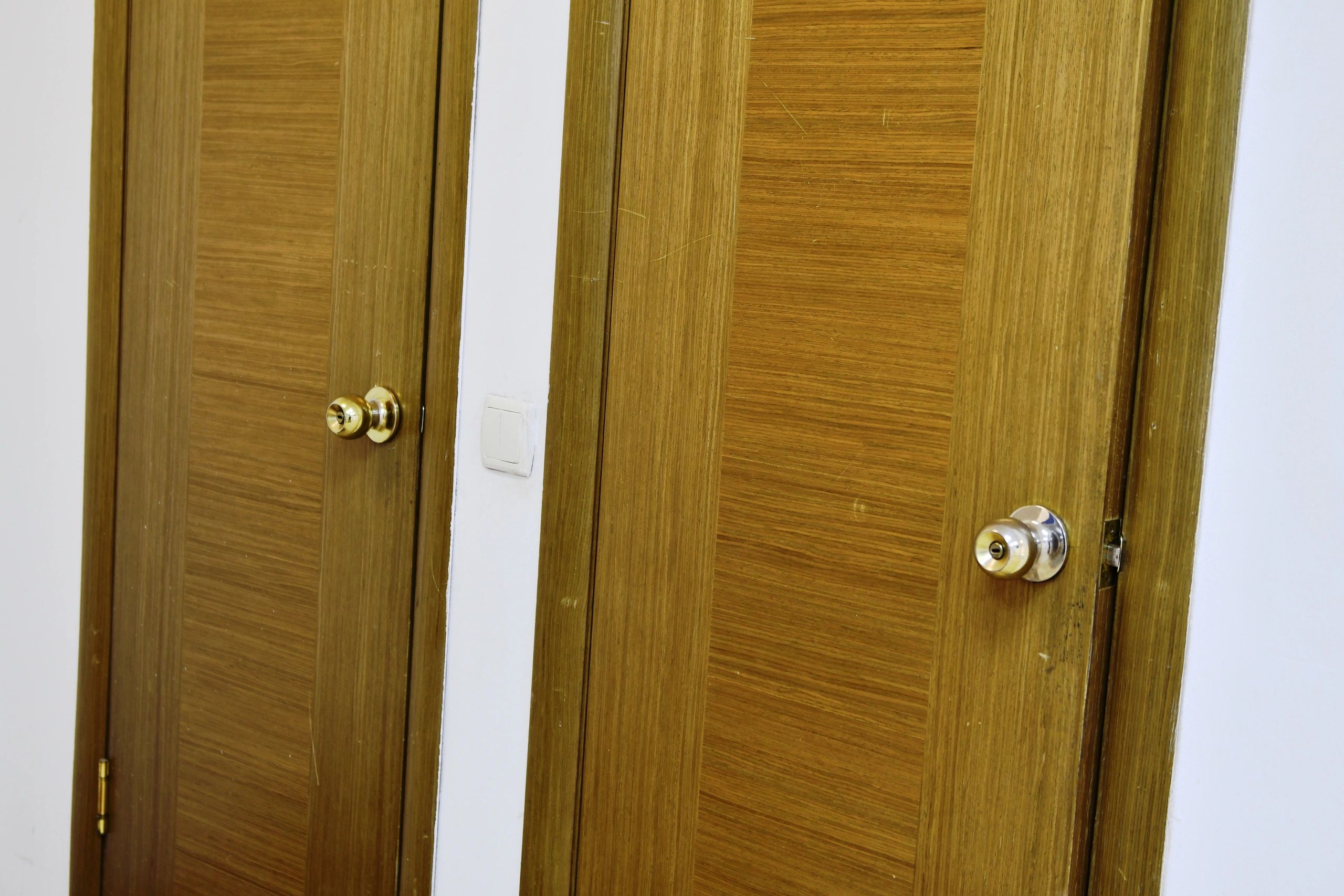 Modern double door hardware in an office-style setting