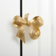 4 Decorative Bow-Shaped Brass Cabinet and Drawer Knobs – 5-Piece Set